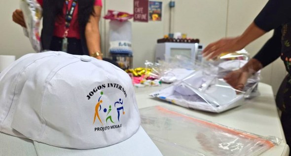 Mexa-se - Jogos internos Na imagem aparece um boné em primeiro plano, com a logo dos jogos internos do TRE-PB