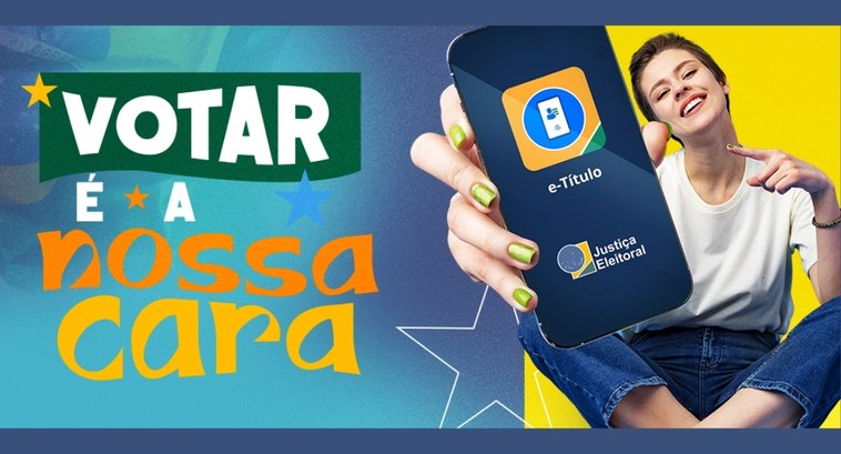 Campanhas promovidas pelo TSE estimulam a participação dos brasileiros nas eleições #PraTodosVerem: Na fotografia aparece uma peça publicitária com a frase "Votar é a nossa cara". ...