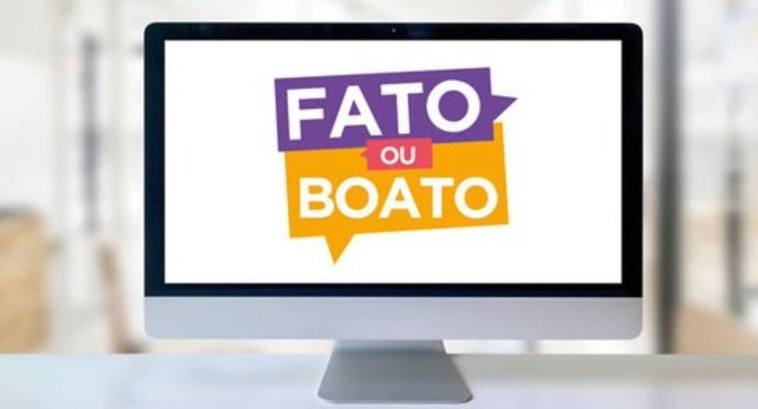 Justiça Eleitoral no combate às Fake News e à Desinformação #PraTodosVerem: Na imagem aparece um monitor de computador, em cima de uma mesa, mostrando a exp...